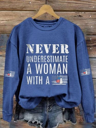 Never Underestimate A Woman Sweatshirt With A DD-214 Veterans Day Ideas Merch