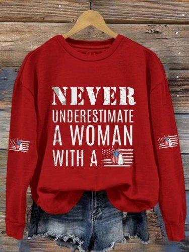 Never Underestimate A Woman Sweatshirt With A DD-214 Veterans Day Ideas Merch