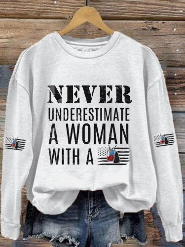 Never Underestimate A Woman Sweatshirt With A DD-214 Veterans Day Ideas Merch