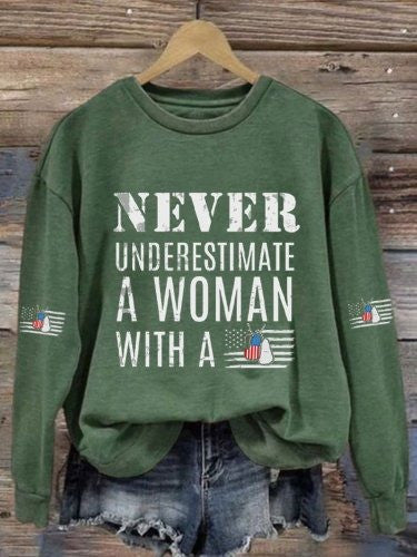 Never Underestimate A Woman Sweatshirt With A DD-214 Veterans Day Ideas Merch